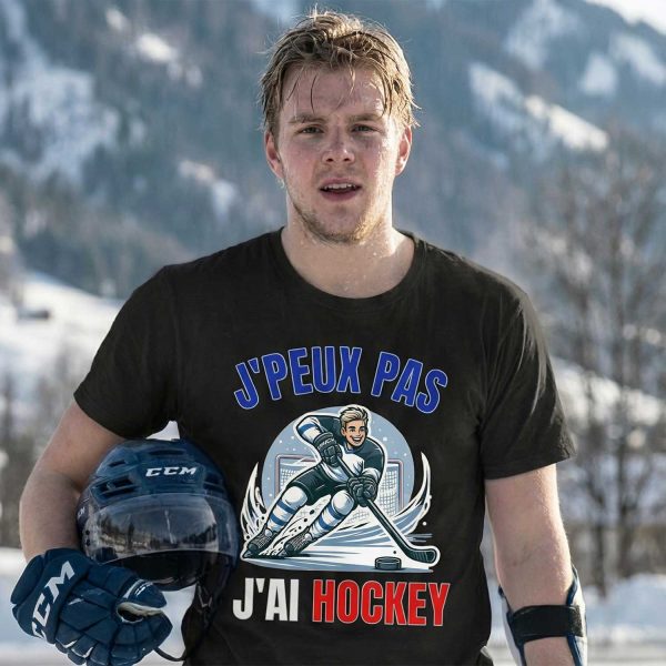 joueur de hockey en extérieur portant un t-shirt humour je peux pas j’ai hockey dans un décor enneigé